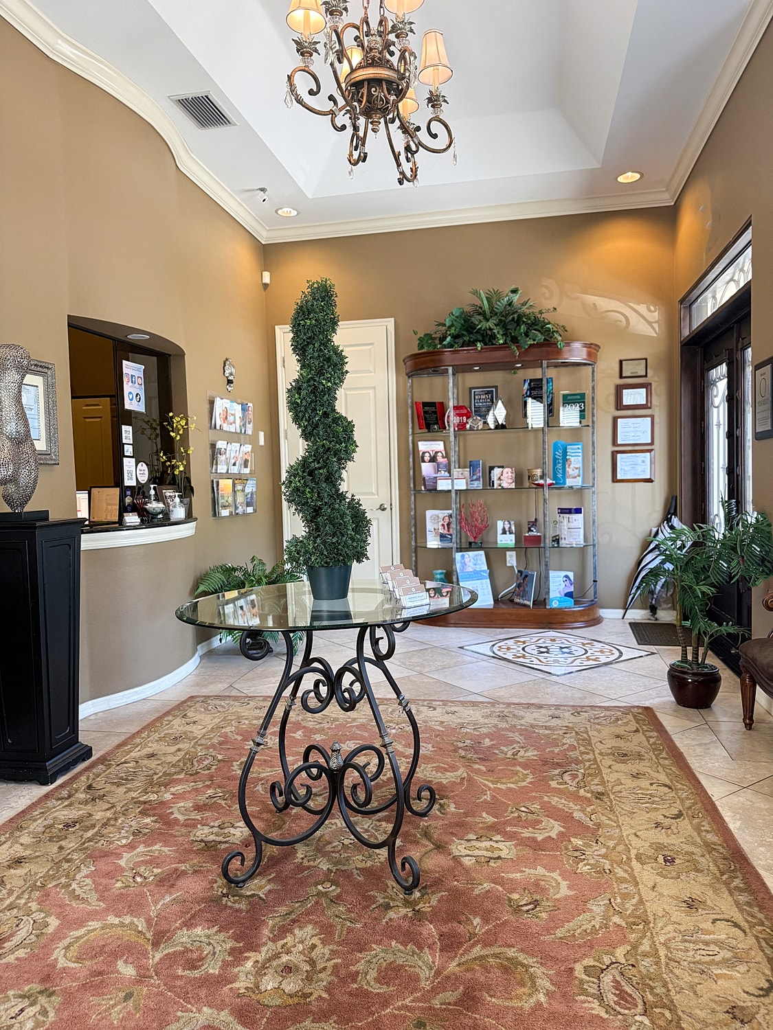 Elegant reception area with decorative plants.