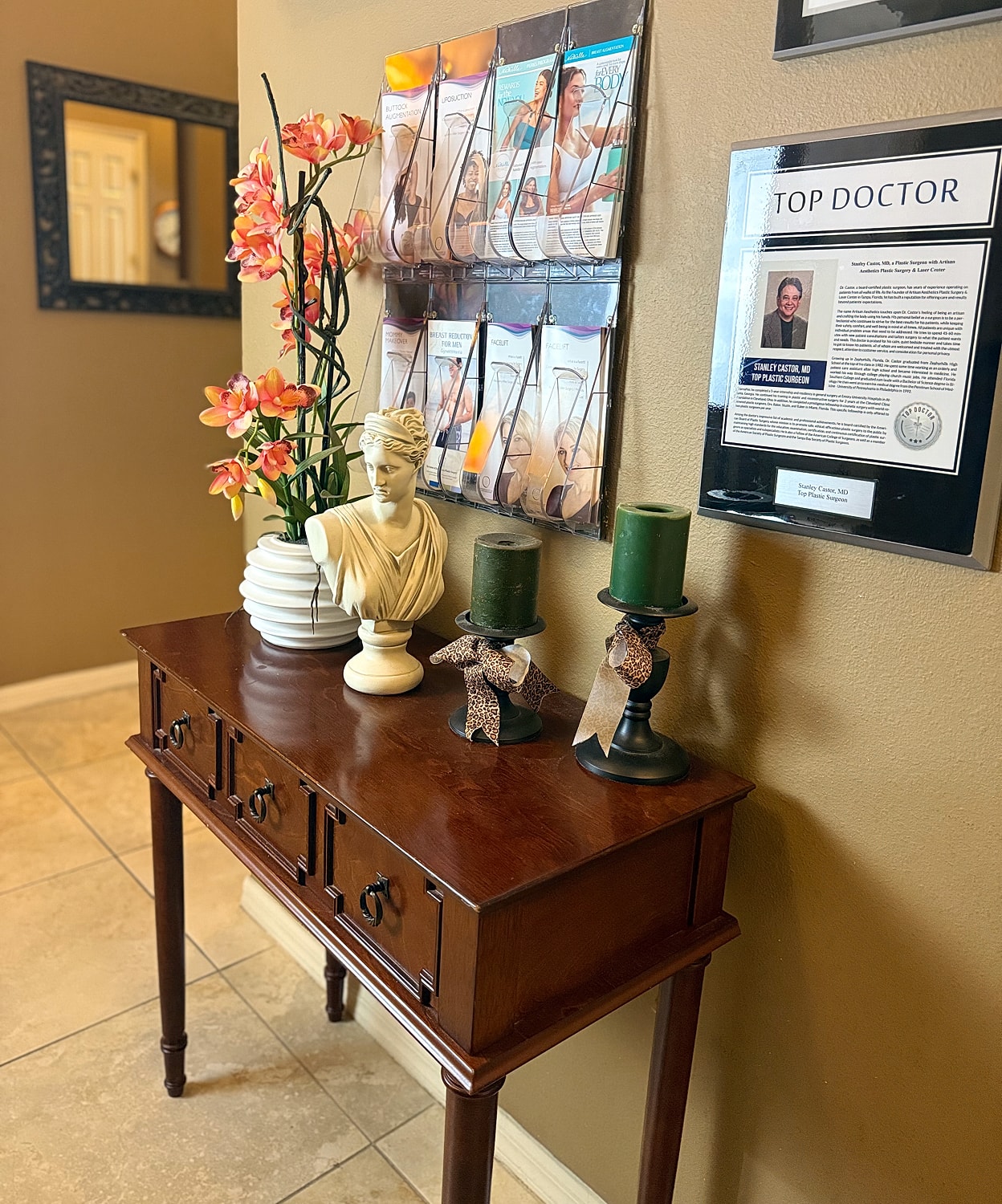 Elegant entryway table with decor and information.
