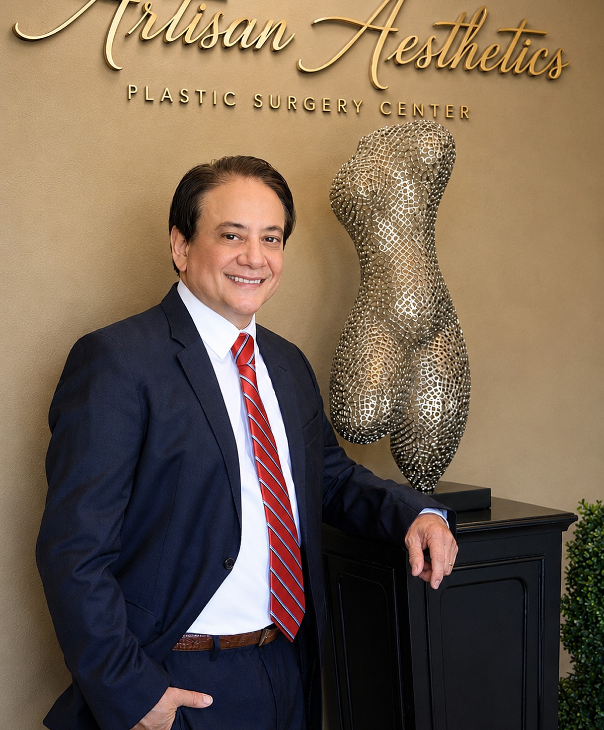 Man in business suit smiling at camera