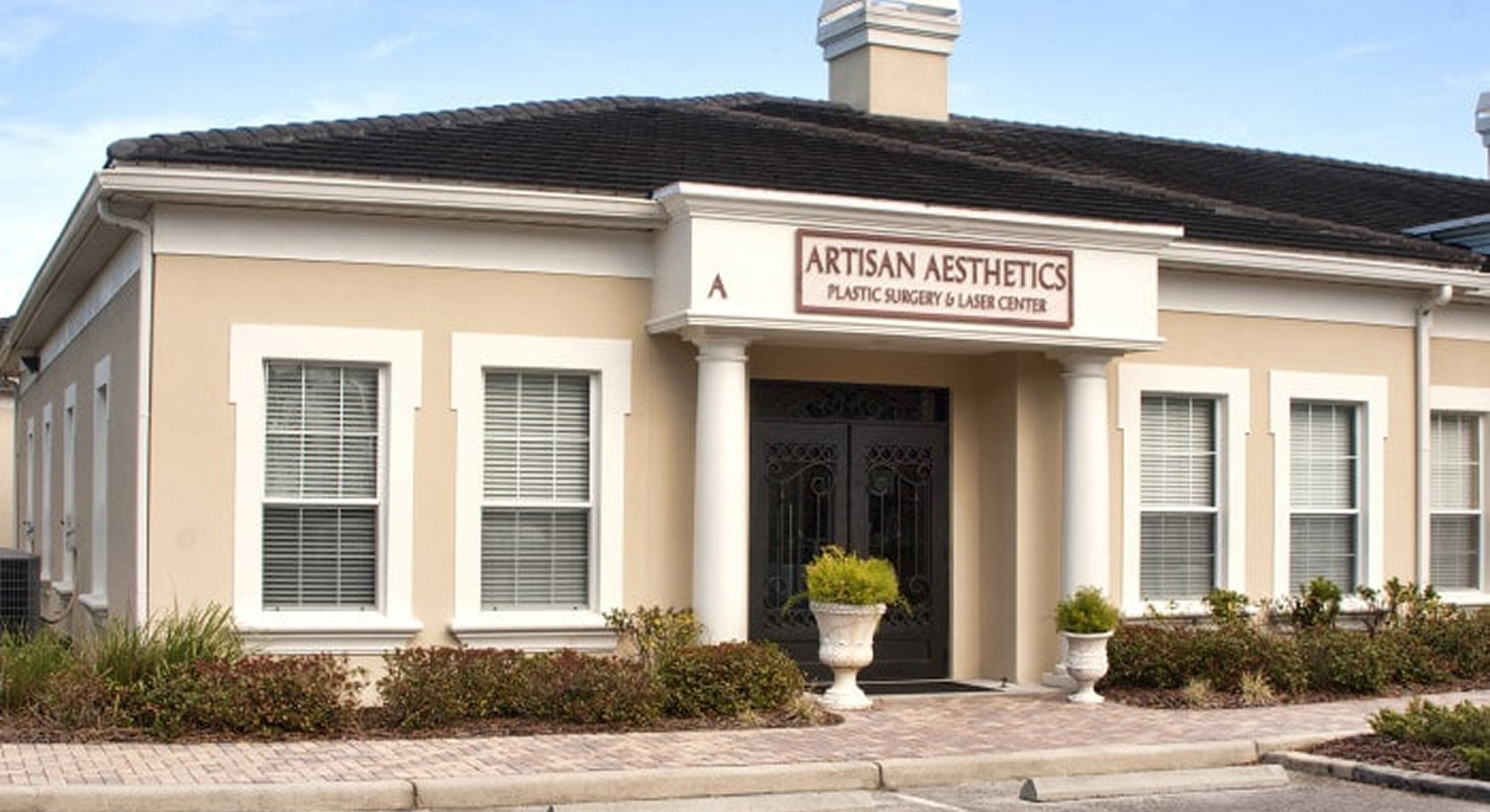 Exterior of Artisan Aesthetics plastic surgery center.